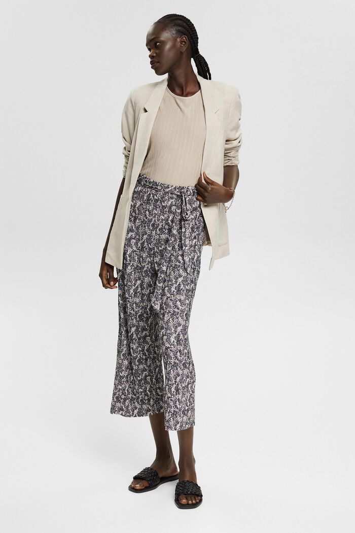 Patterned trousers with a crinkle finish