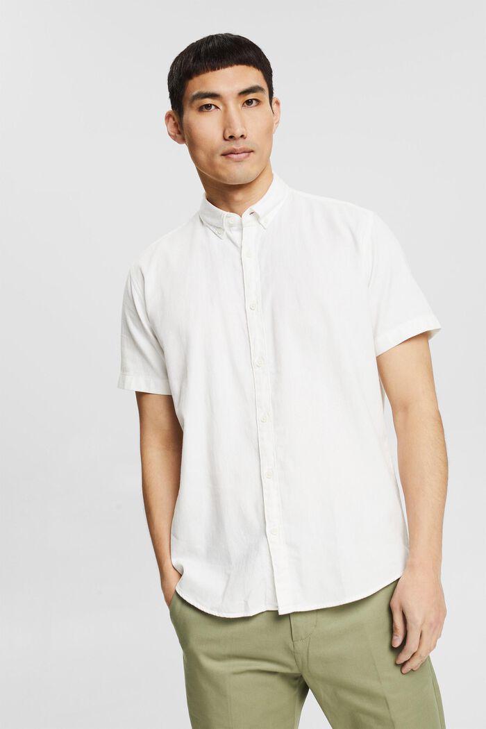 Top with a button-down collar