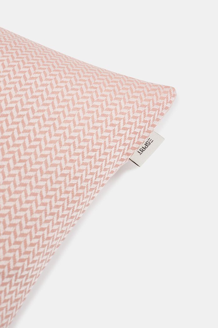 Cushion cover with a herringbone texture