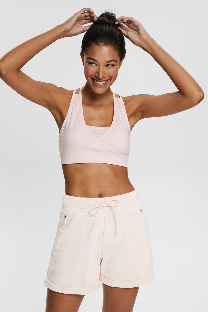 Sports bra in a wrap-over look, made of recycled material, LIGHT PINK, detail image number 0