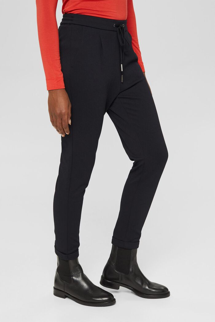 Tracksuit bottoms with an elasticated waistband, made of recycled material, BLACK, detail image number 0