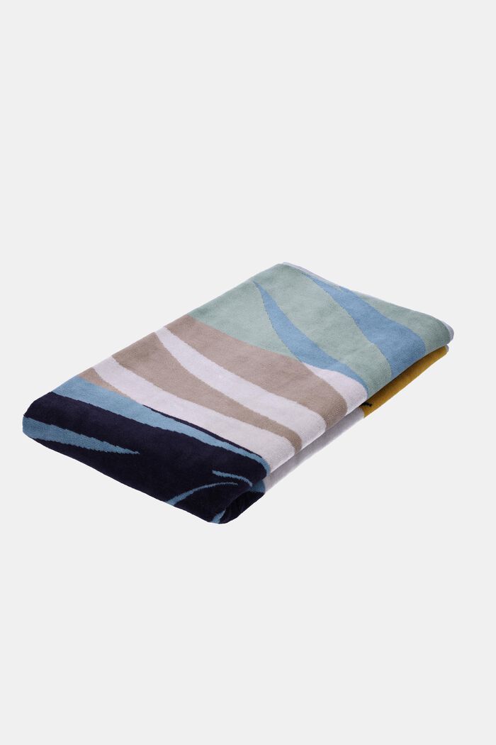Striped towel with palm leaf